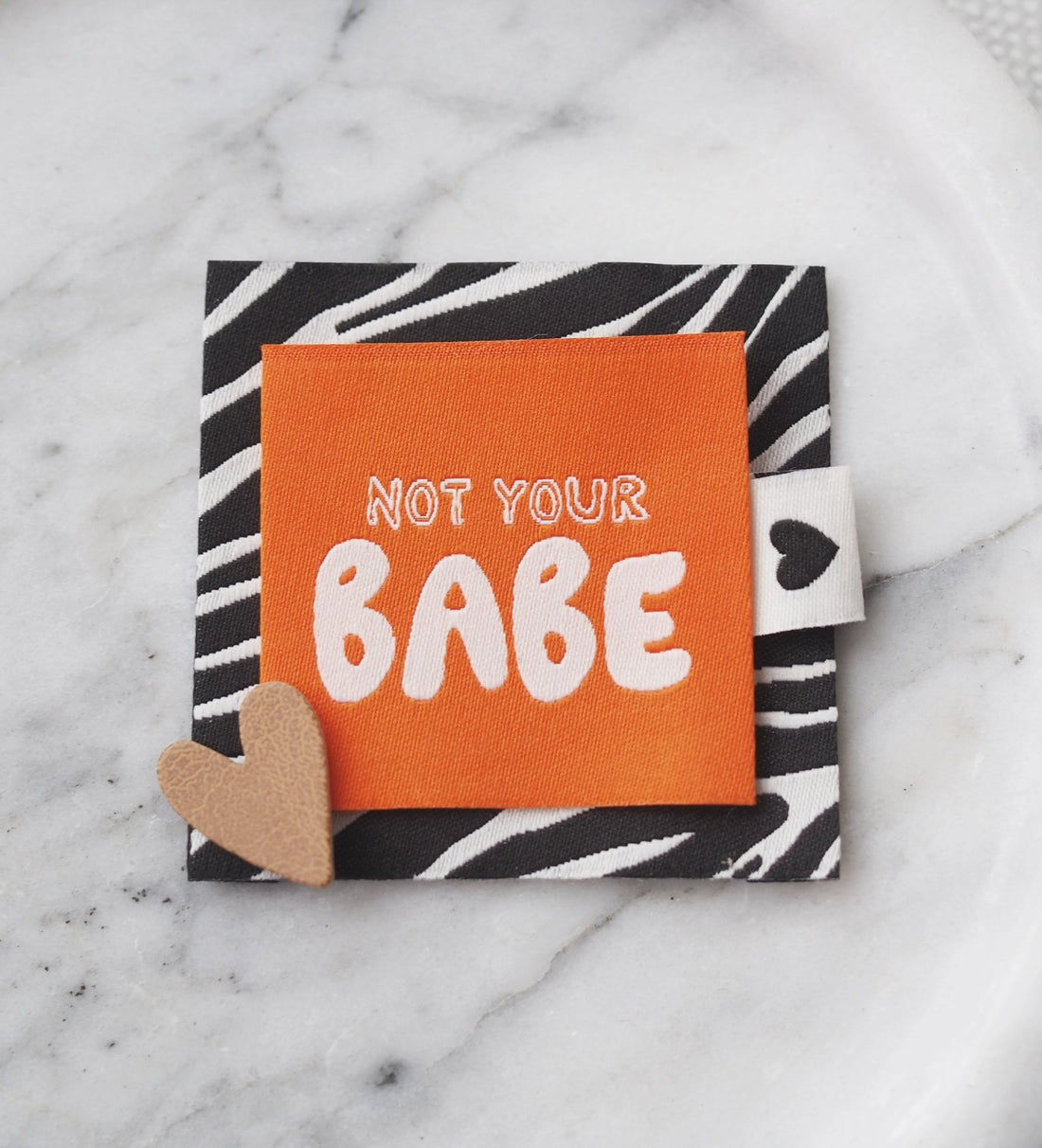 Weblabel *not your babe* orange - Paul &amp; Clara